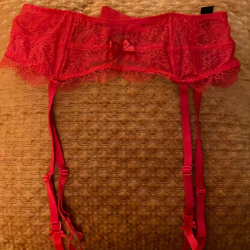 Xsmall red Lacey garter belt new with tags from Victoria’s Secret